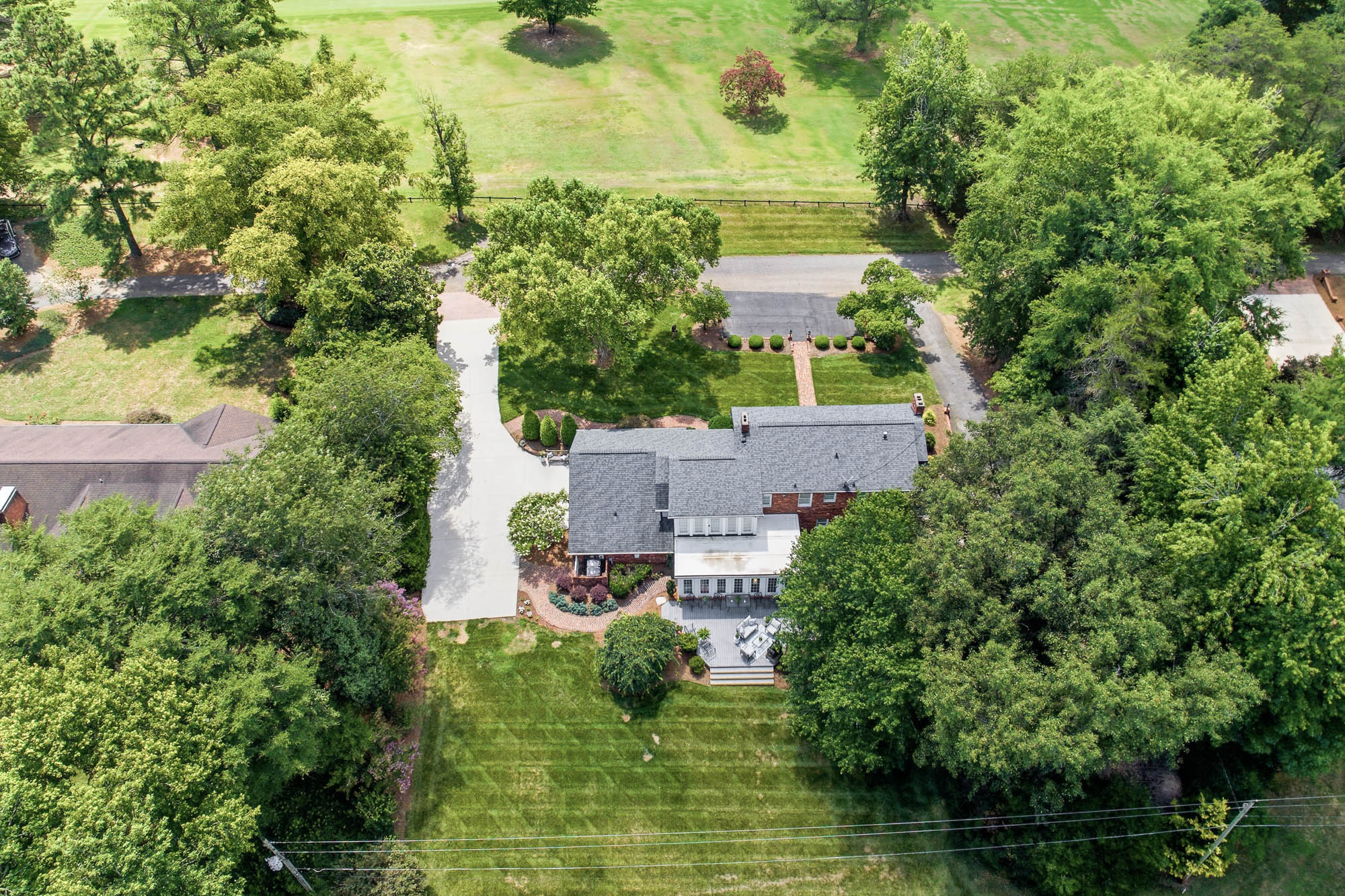 Oakmont home beside the fairways of Statesville Country Club